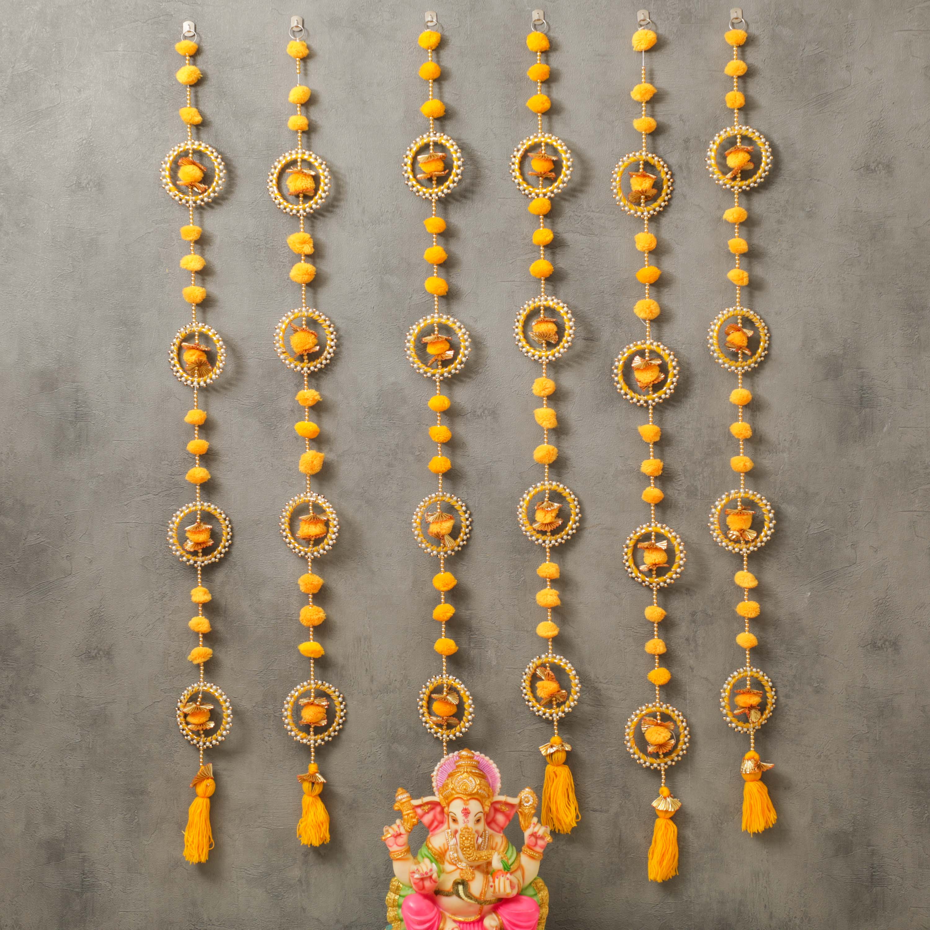 Yellow pompom garlands for decoration